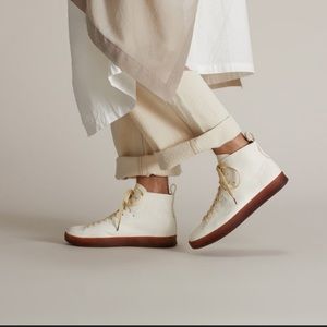 Hand sewn high latex Feit sneakers